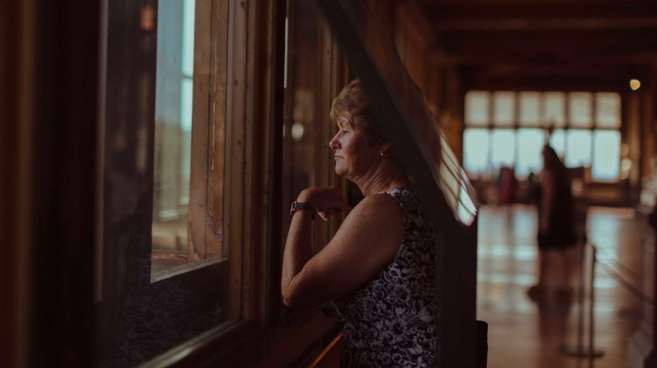 window portrait, warm cinematic